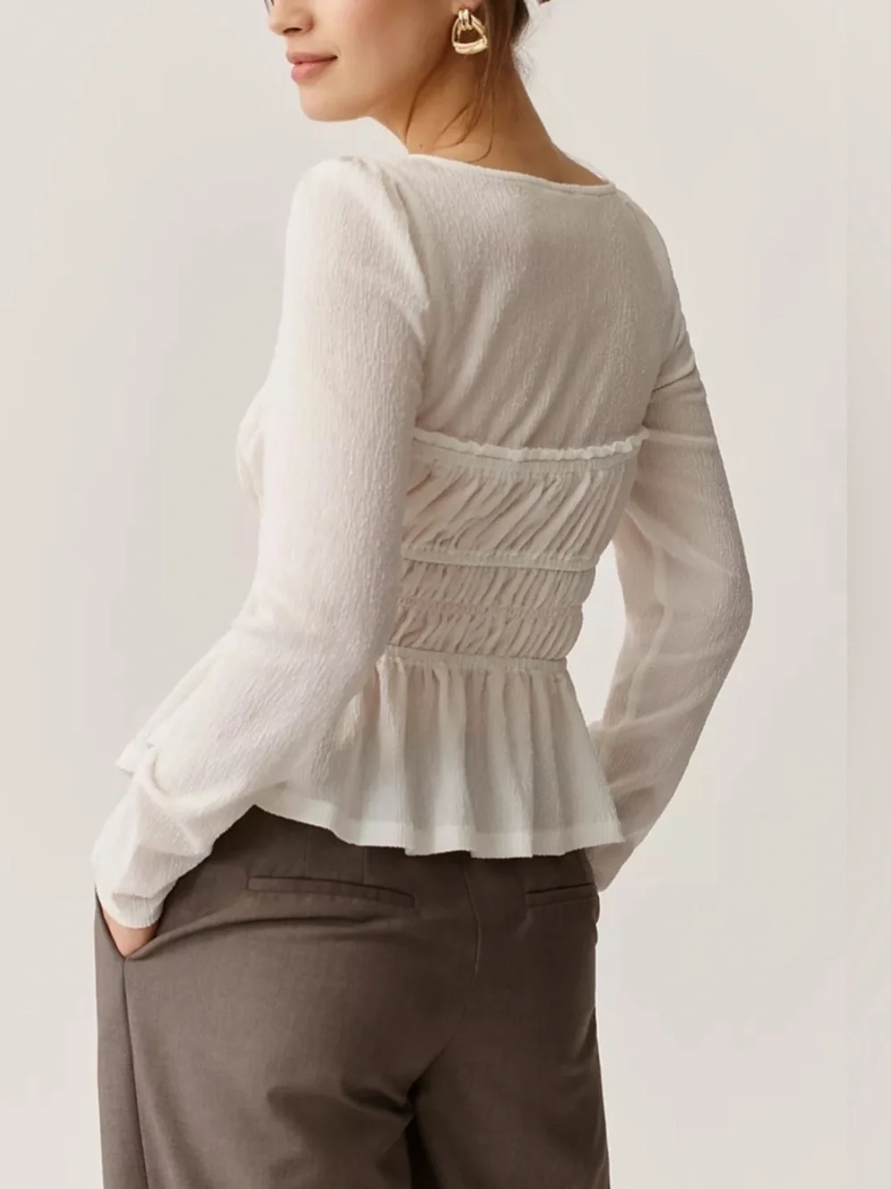 Anthropologie White Smocked Peplum Long-Sleeve Top